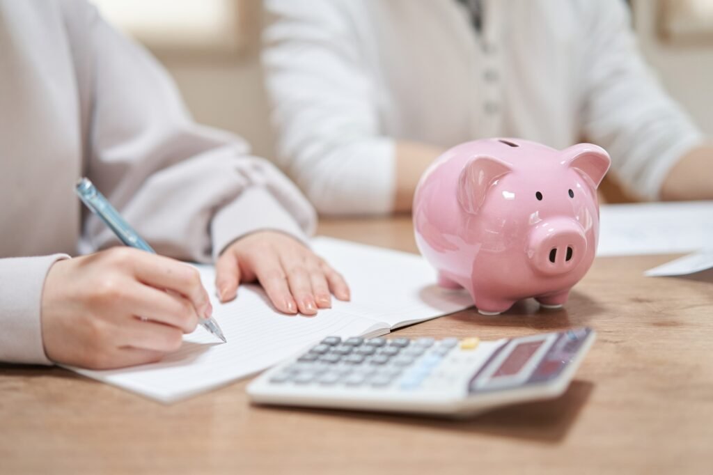 Asian couple reviewing household budget